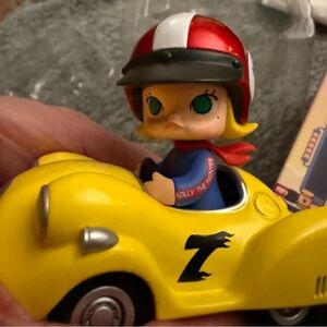 Highly collectible-Molly Car Car Discontinued series. “Banana 7”